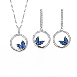 Detailed view of S925 sterling silver set with blue marquise stones and micro-pave crystals
