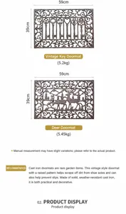 Detailed view of heavy-duty cast iron outdoor doormats with reindeer and key patterns