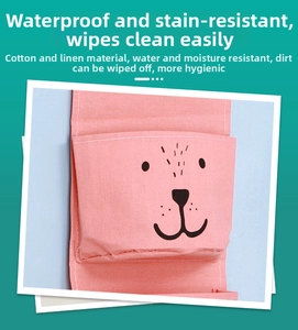 Detail of pink cotton linen wall hanging storage bag with waterproof and anti-fouling fabric