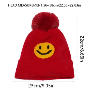 Size chart for knit beanie showing dimensions with red hat and yellow smiley patch
