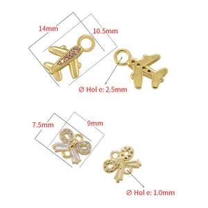 Gold airplane and bow pendants with zircon inlays and detailed size dimensions