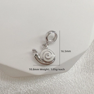 Macro view of S925 silver snail pendant with white enamel detail and dimensions