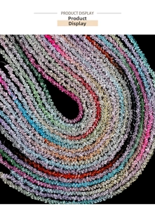 Close-up of vibrant gradient crystal triangle beads for DIY jewelry and accessory making