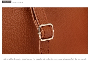Macro detail of brown litchi grain leather bag showing gold adjustable metal buckle