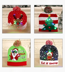 Detail of LED light-up knitted Christmas hat with deer pattern and power switch