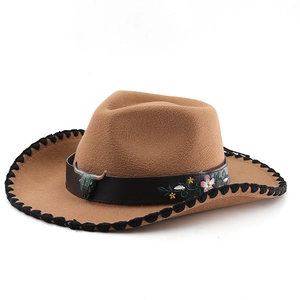 Brown western cowboy hat with bull skull metal ornament and floral embroidery