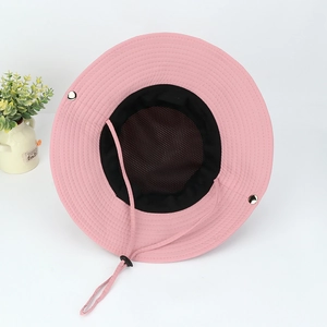 Pink sun hat detail showing breathable black mesh lining and adjustable chin strap
