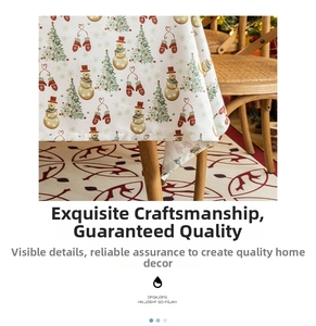 Detail showing high-density festive fabric tablecloth with snowman and tree patterns