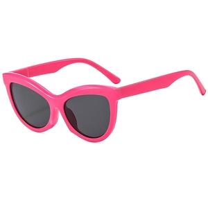Stylish cat-eye sunglasses with vibrant magenta frame and dark lenses at 45-degree angle