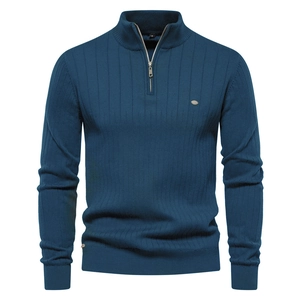 Detail of blue men's sweater featuring a metal zip neck and vertical ribbed knit texture