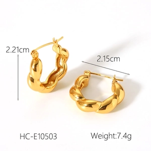 Detailed view of 18K gold twisted hoop earrings showing 2.2cm size and 7.4g weight