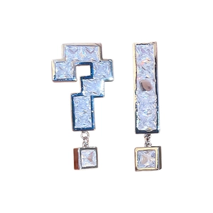 Asymmetric zircon earrings featuring pixel art question and exclamation mark shapes