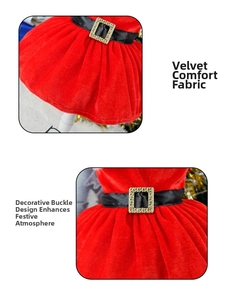 Close-up of velvet dog Christmas dress featuring a black satin belt and golden buckle