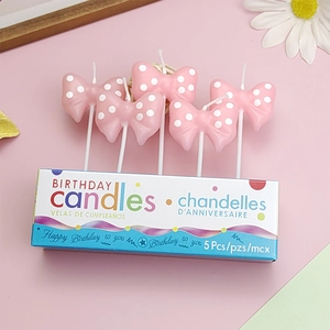 Pink polka dot bow birthday candles for party cake decoration, 5 pieces per box
