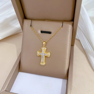 Gold titanium steel cross necklace with sparkling zircons presented in a premium gift box