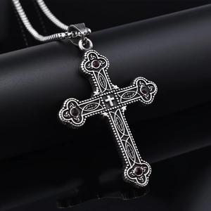 Polished silver Viking cross necklace pendant with a vibrant red gemstone inlay