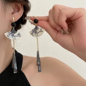 Boucles d'oreilles éventail de style chinois avec motif bambou et longs glands