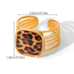 Detailed view of leopard print square ring with gold open band and dimensions