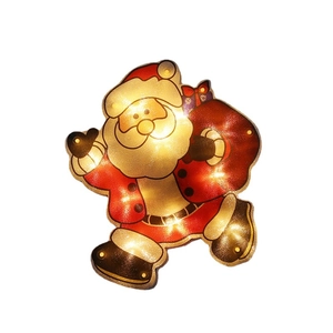 Hanging LED Santa Claus ornament with warm glowing light for Christmas tree decoration