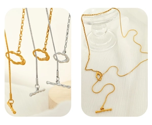 Detail view of gold and silver snake chains with irregular lava ring and OT toggle clasp