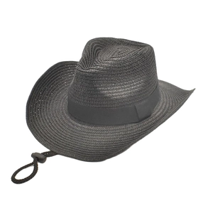 Close-up of black straw cowboy hat featuring fine weave pattern and adjustable wind cord