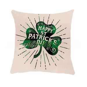 Close-up of Saint Patrick's Day pillowcase with green plaid clover and holiday greetings