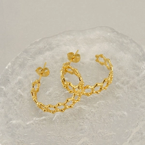 Golden hexagonal honeycomb hollow earrings with micro-bead texture in stainless steel