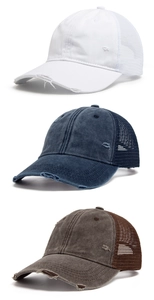 Detailed view of washed distressed baseball caps with breathable mesh and ripped edges