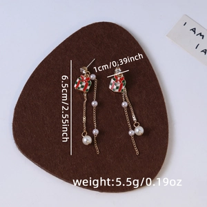 Detailed view of Christmas tassel earrings with length and weight measurement specs