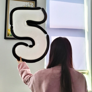 Comic style number 5 foil balloon with black and white borders for birthday party decoration