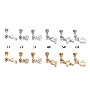 Flat back 316L surgical steel labret studs featuring diverse music and star charms