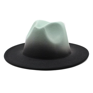 Detail view of the green and black gradient wool felt wide brim fedora hat texture