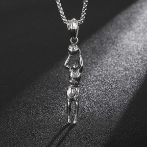Detailed close-up of a vintage silver steel basketball player pendant with box chain