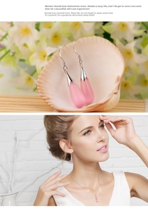 Detail view of pink opal teardrop pendant necklace and matching drop earrings for women