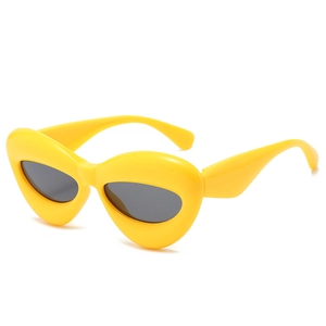 Chic bubble-style yellow cat eye sunglasses with dark gray lenses for a retro fashion look