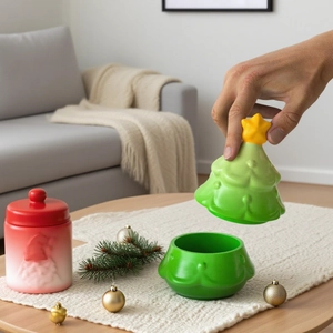 Detailed view of Christmas Santa and tree storage jars in a cozy holiday home setting