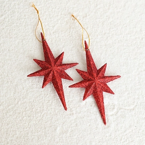 Two red glitter octagonal star ornaments with gold strings for Christmas tree decoration