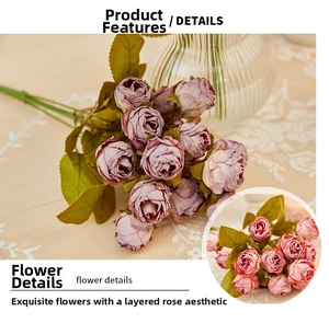 Detail view of artificial burnt-edge roses with multi-layer vintage dusty purple petals