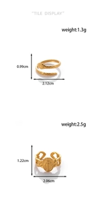 Detailed view of adjustable gold snake ring and Virgin Mary medallion ring with dimensions