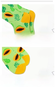Close-up of seamless toe and heel design on colorful papaya pattern cotton crew socks