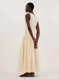 Robe longue élégante beige sans manches en coton avec col en V et taille à cordon