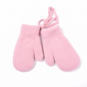 Detailed texture of pink plush knit mittens with a neck strap for baby winter warmth