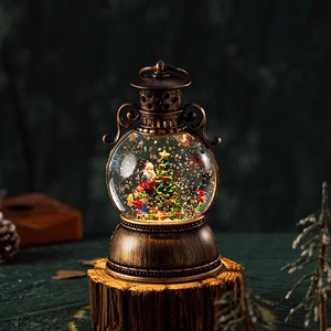 Christmas musical snow globe lantern with Santa Claus and LED lights on wooden base