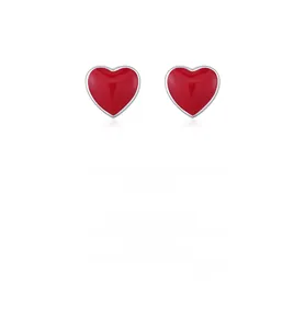 Detail of red heart-shaped S925 silver stud earrings with high-gloss enamel finish