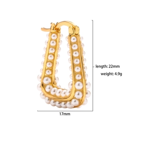 Detailed view of U-shaped gold plated pearl earrings with 22mm length specifications