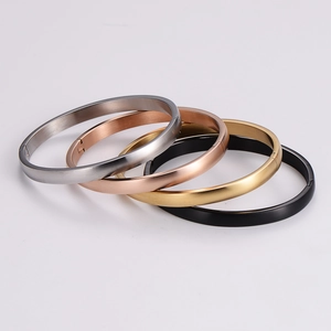 Minimalist matte brushed metal bangles in silver, rose gold, gold, and black finishes