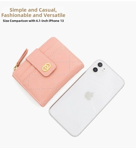 Pink quilted faux leather wallet detail featuring classic stitching and gold buckle