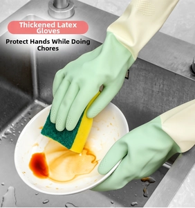 Close-up of non-slip latex cleaning gloves with diamond texture for kitchen use