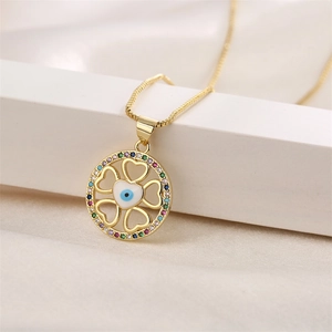 Bohemian gold clover necklace with colorful zircon and blue evil eye pendant detail