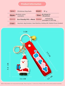 Detail of Santa Claus PVC keychain with dimension markings and golden lobster clasp